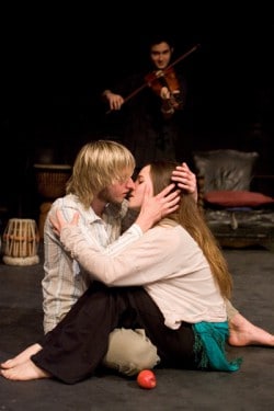 Actors kissing on stage